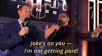 A gif of two guys saying 'Joke's on you, I'm not getting paid'