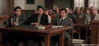 A gif from My Cousin Vinnie of a lawyer leaning back in a chair.
