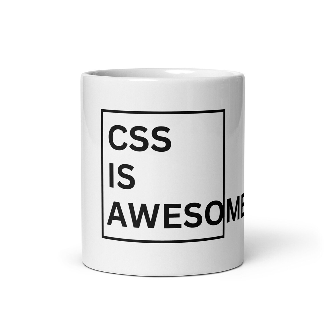 A mug that says 'CSS is Awesome' with a box around it, but the box cuts off the 'me' in awesome.
