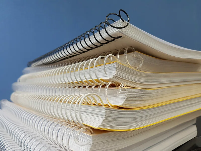 A stack of spiral notebooks